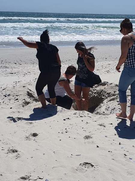 relaxing under the tree